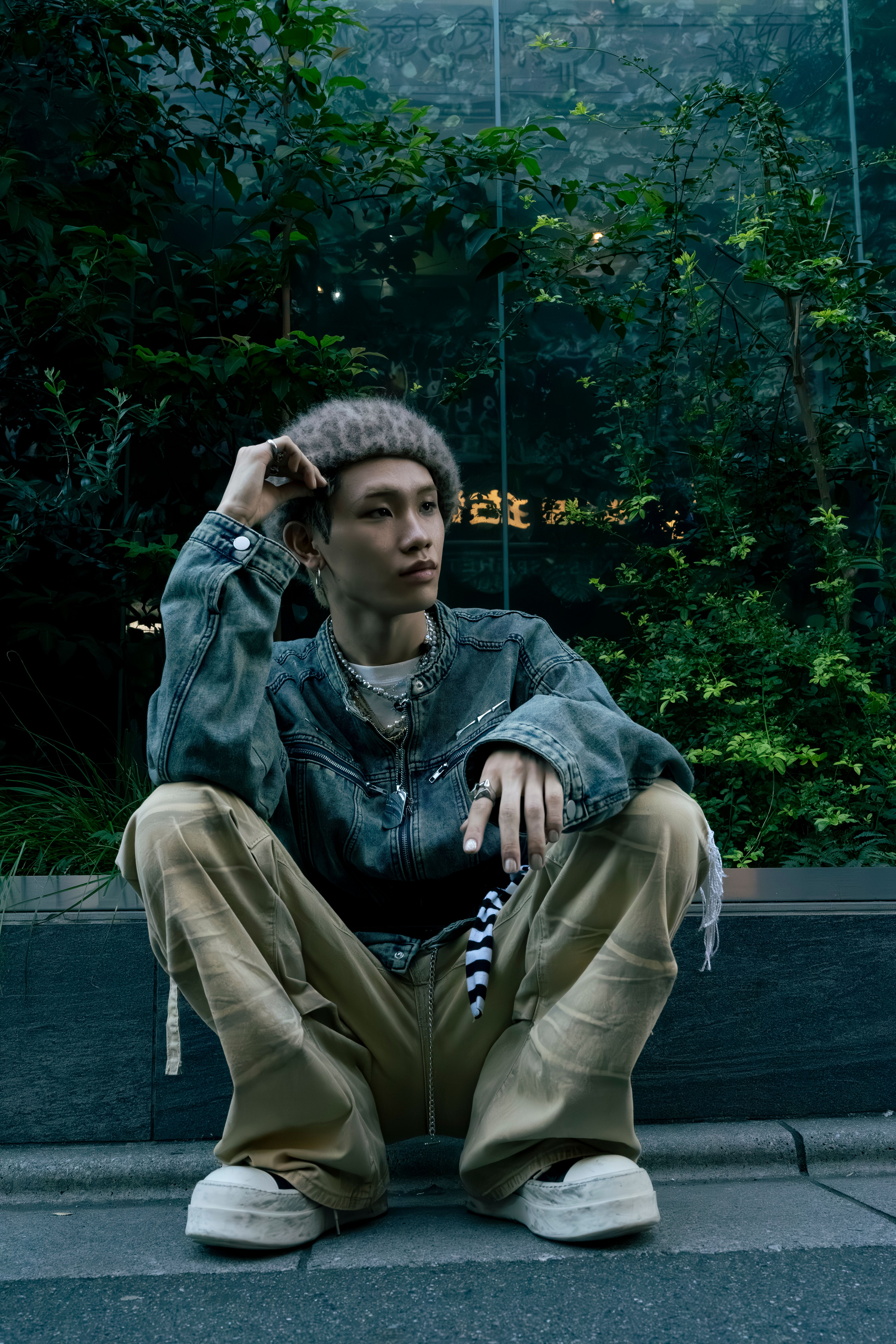 Japanese shop assistant showing of his style